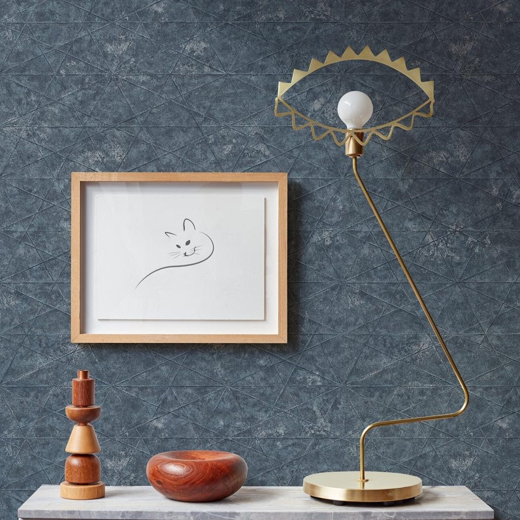 A hallway scene featuring an Advantage wallpaper of blue geometric shapes adorning the wall Pattern: 4096-554366